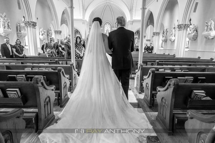Bride and groom at St. Paul on the Lake Catholic Church wedding