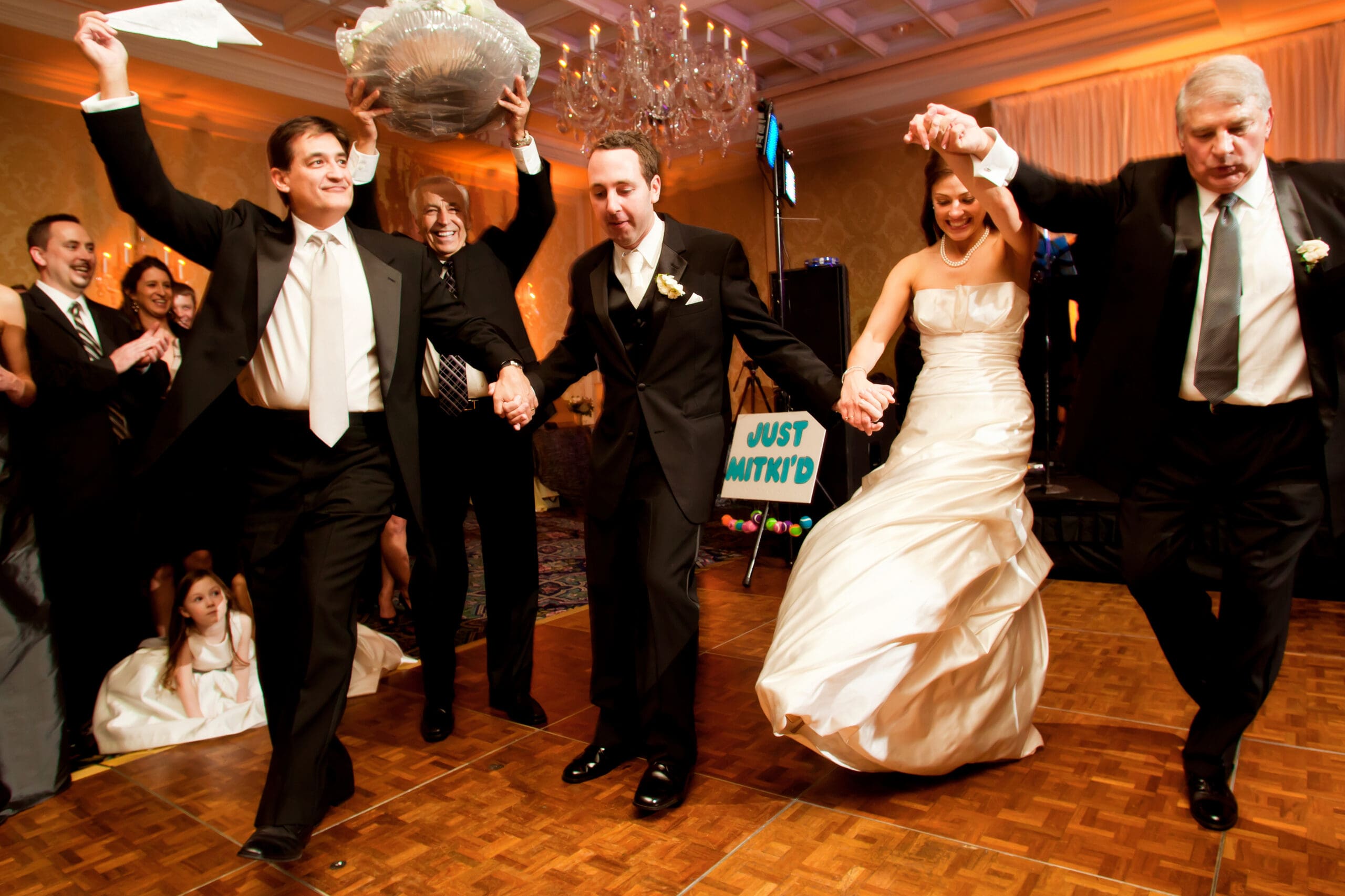 Wedding guests reacting during heartfelt ceremony moment