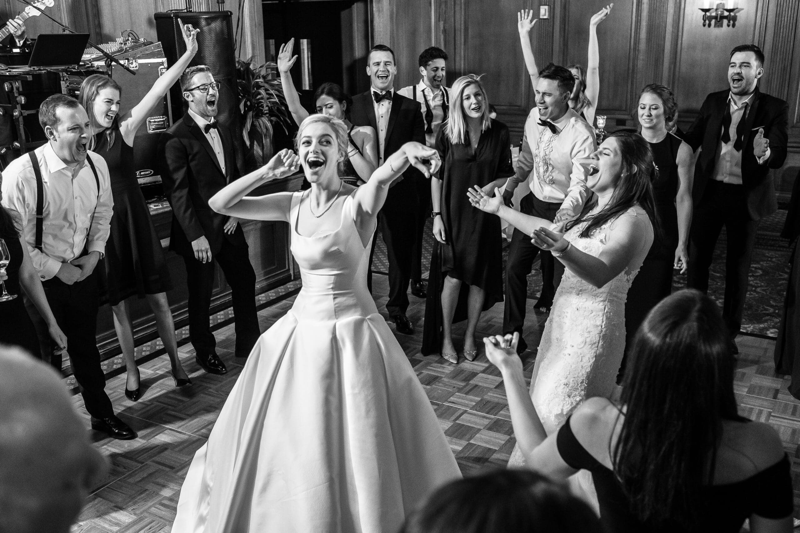 Bride and groom laughing together during reception