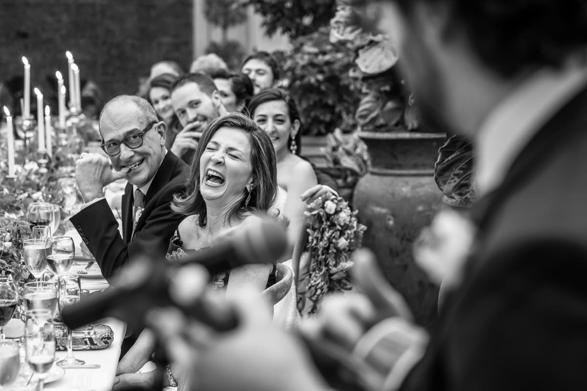Guests listening during emotional wedding speeches