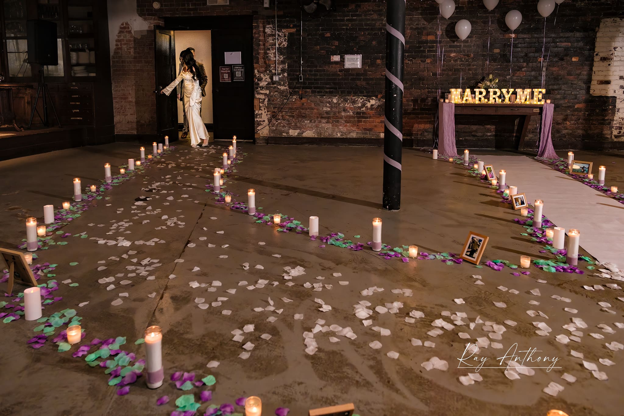 Detroit proposal at The Congregation romantic setup in basement
