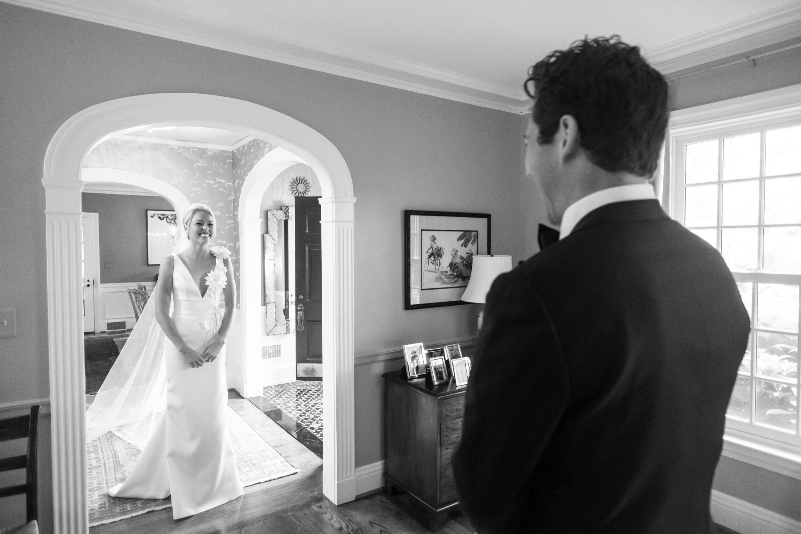 couple laughing together during pre-ceremony portrait session