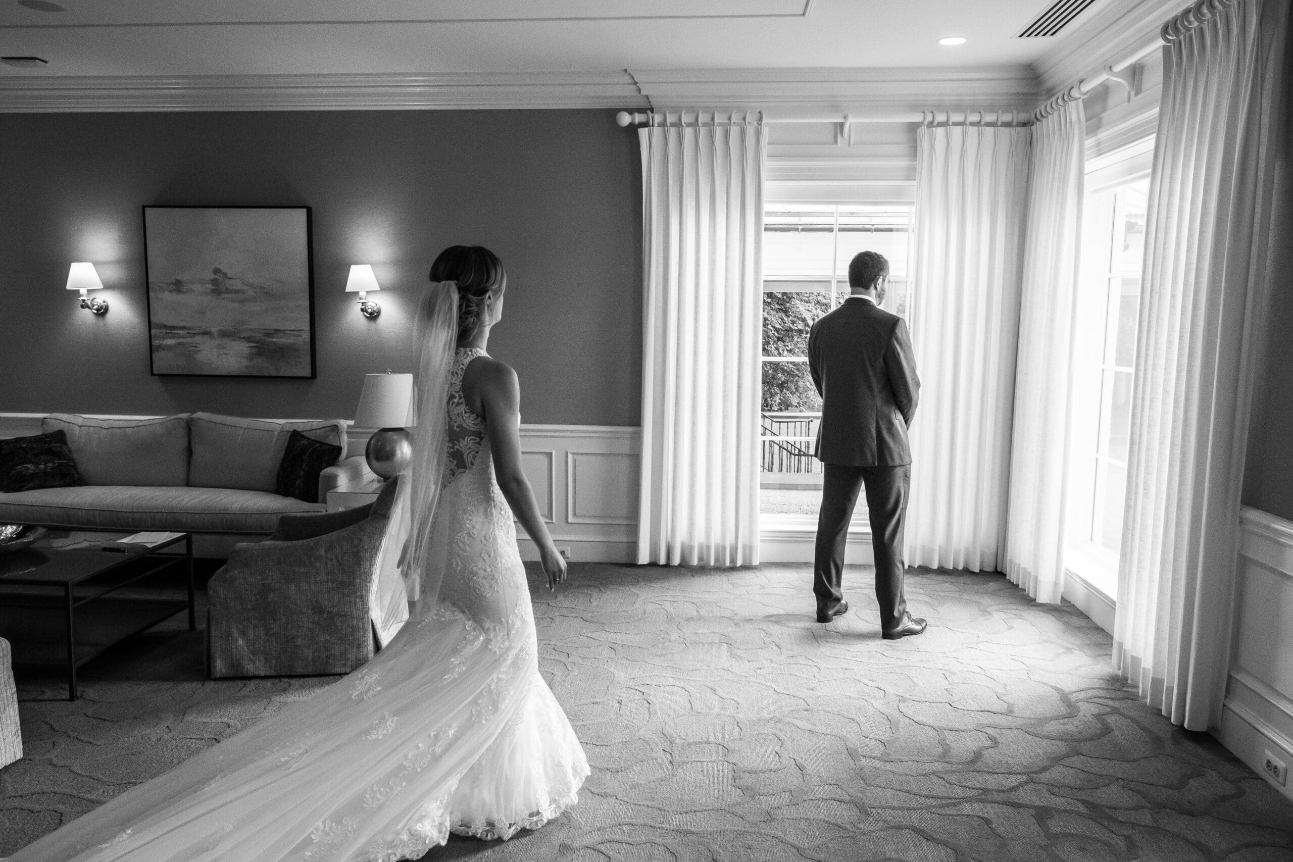 documentary photo of couple during a first look on wedding day