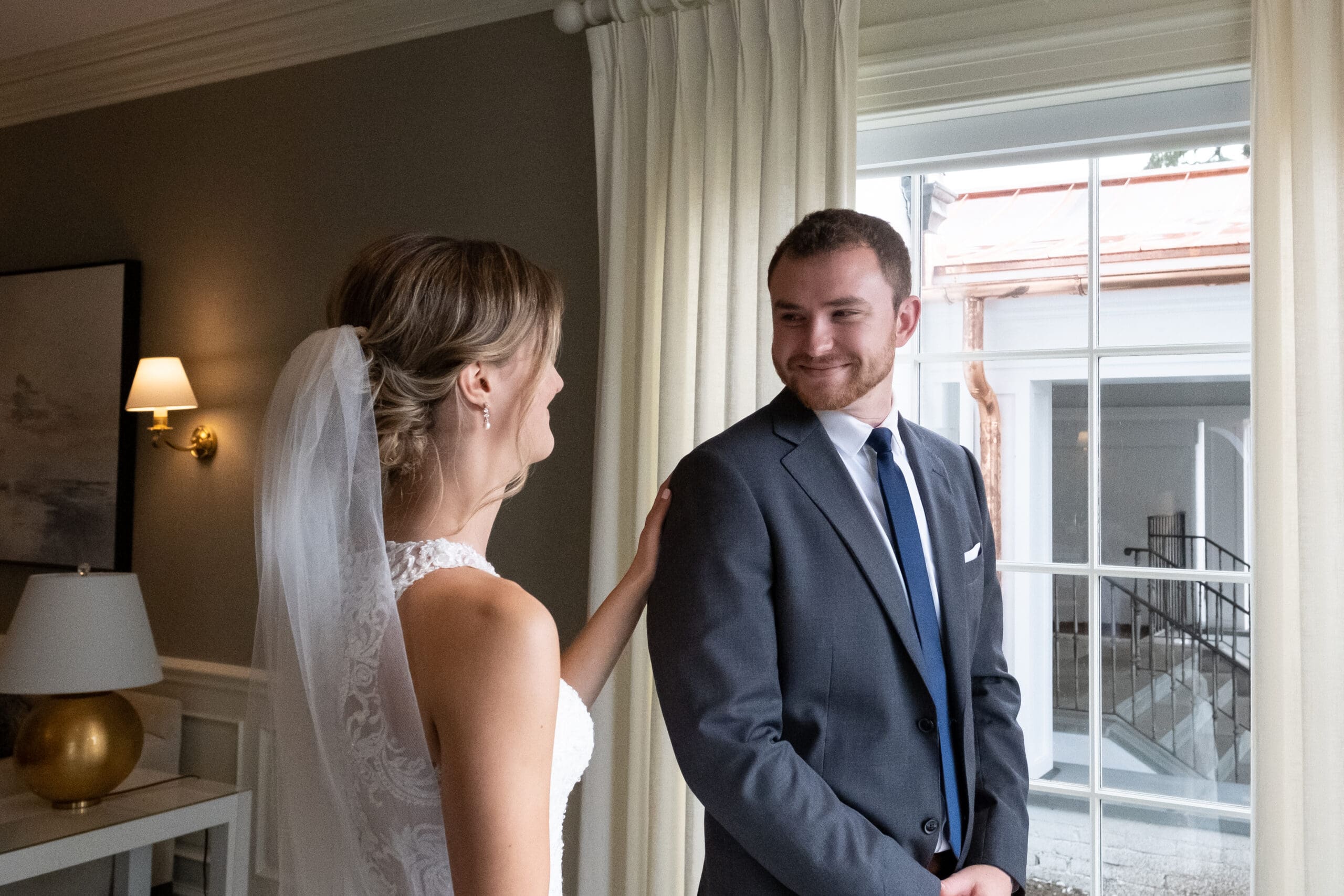 couple smiling together after seeing each other privately