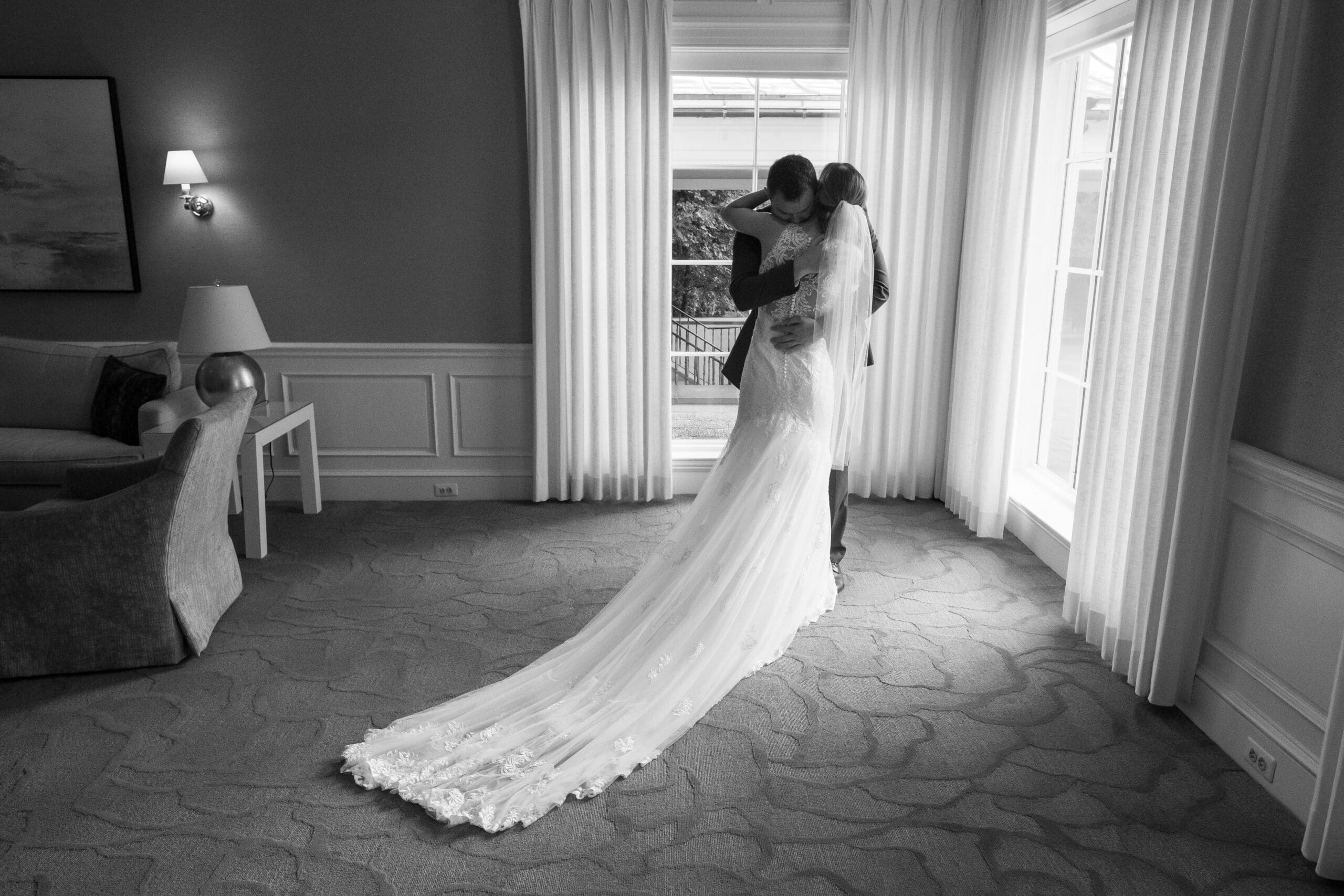 natural moment between bride and groom before ceremony
