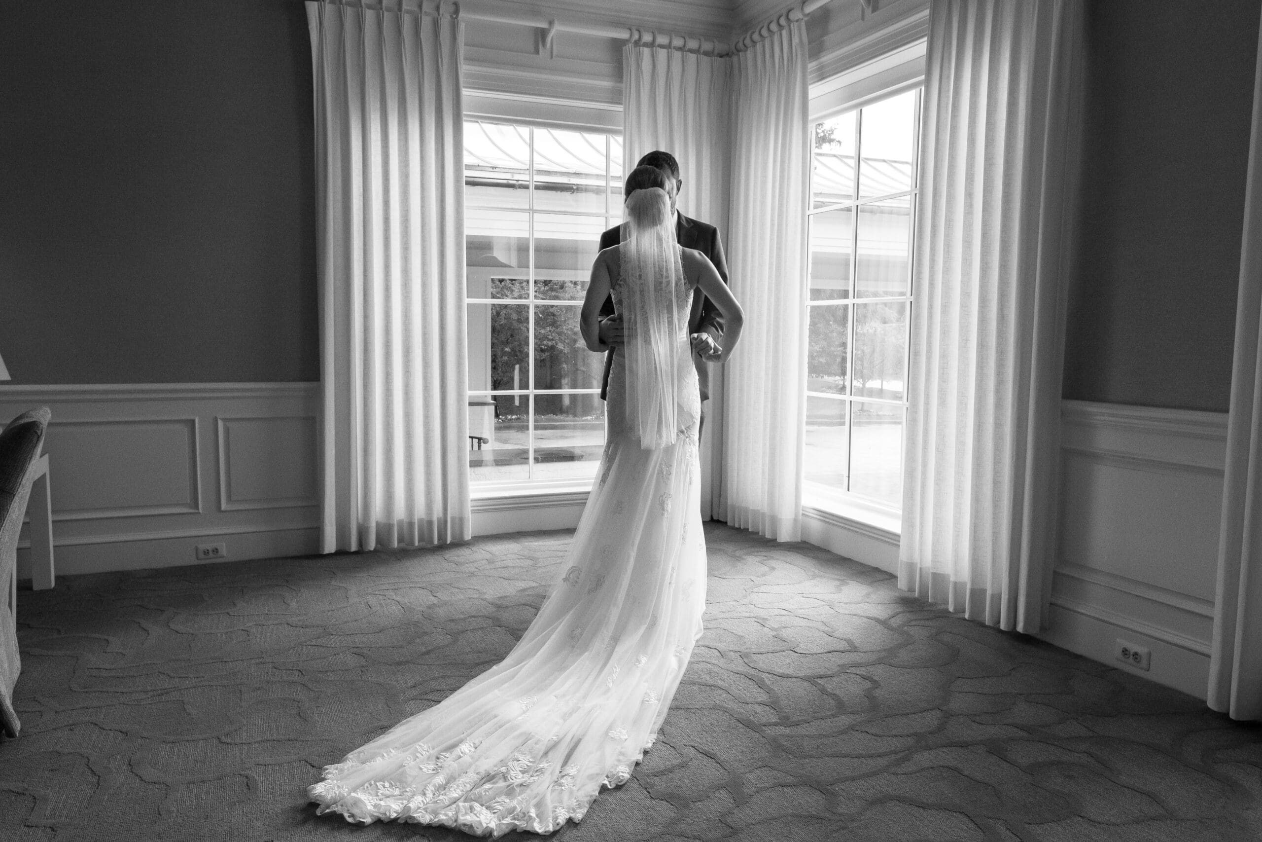 bride and groom sharing a calm moment during wedding portraits