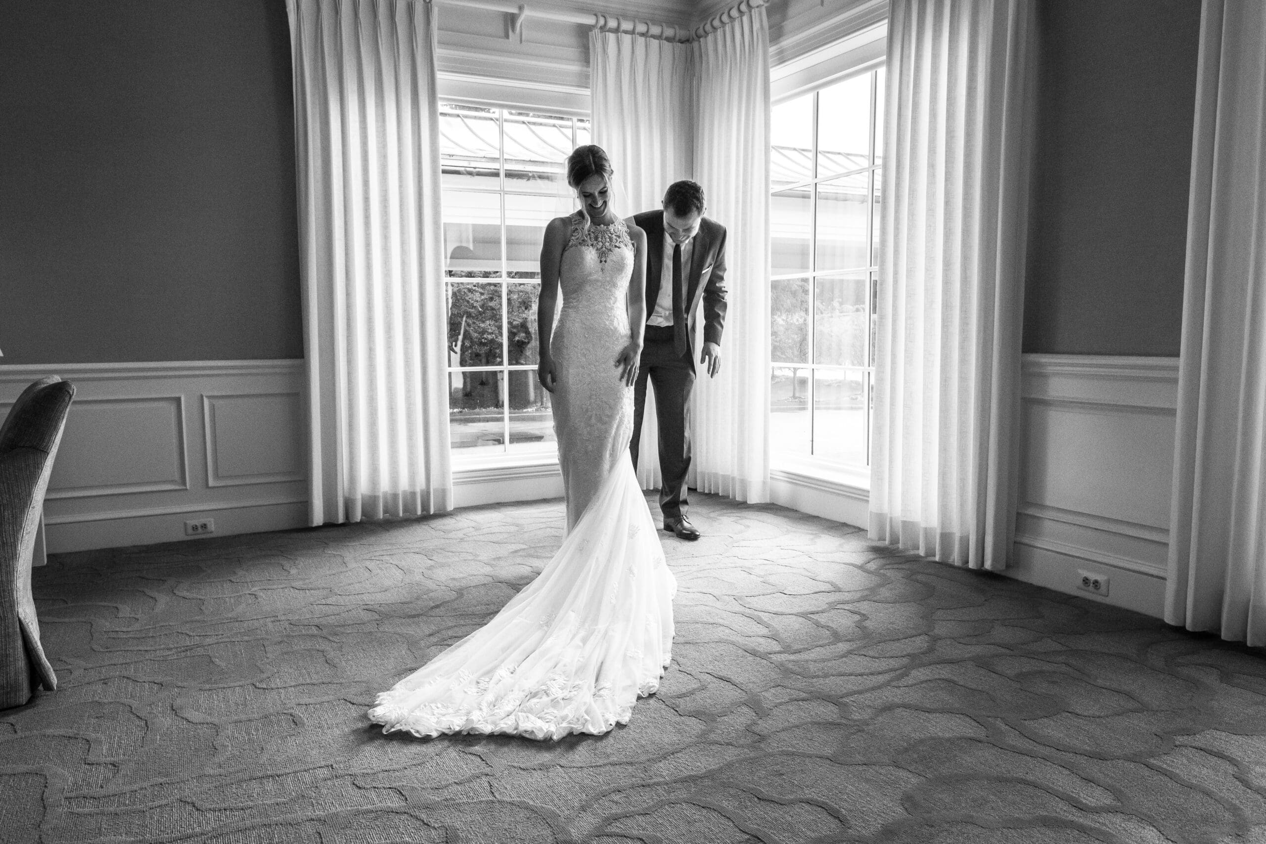 couple holding hands during a quiet moment before ceremony