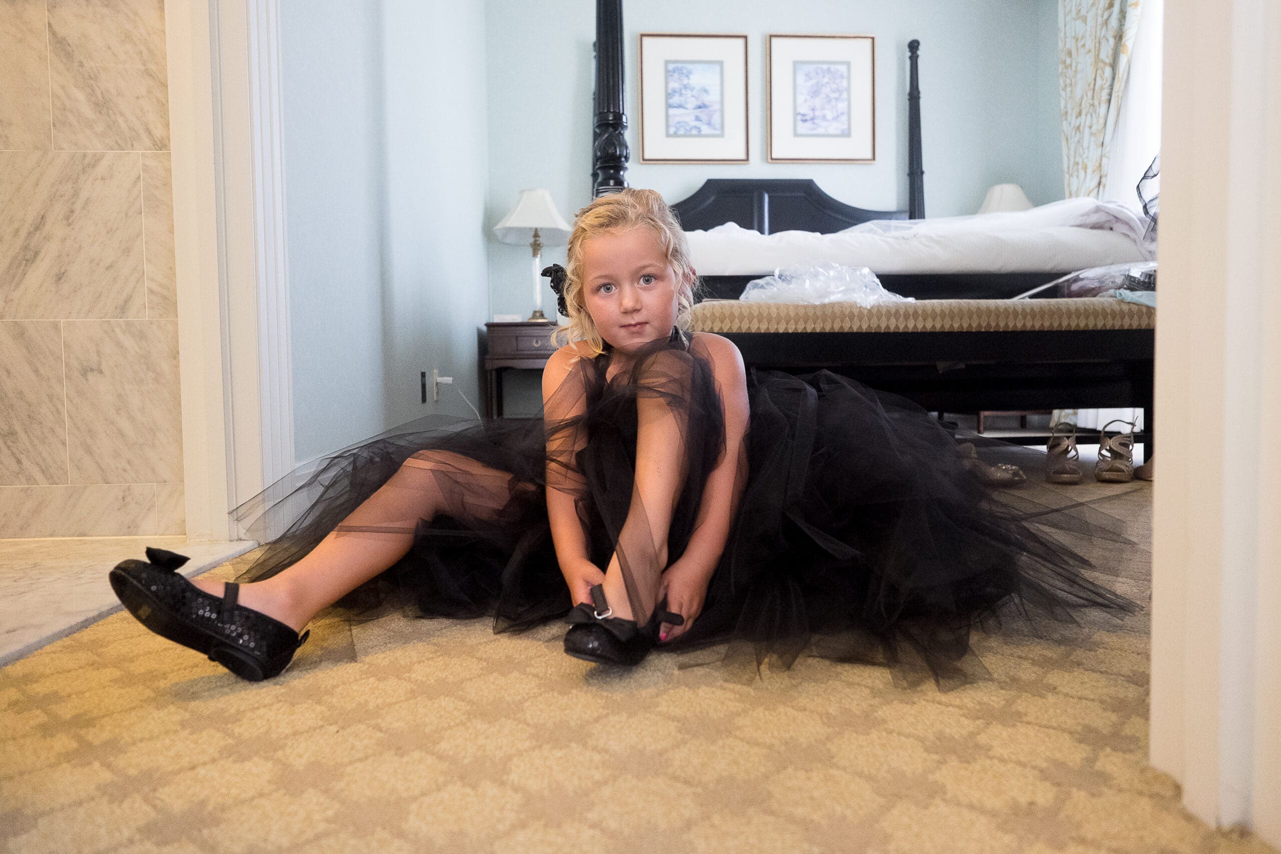 ring bearer waiting during a wedding ceremony in Michigan
