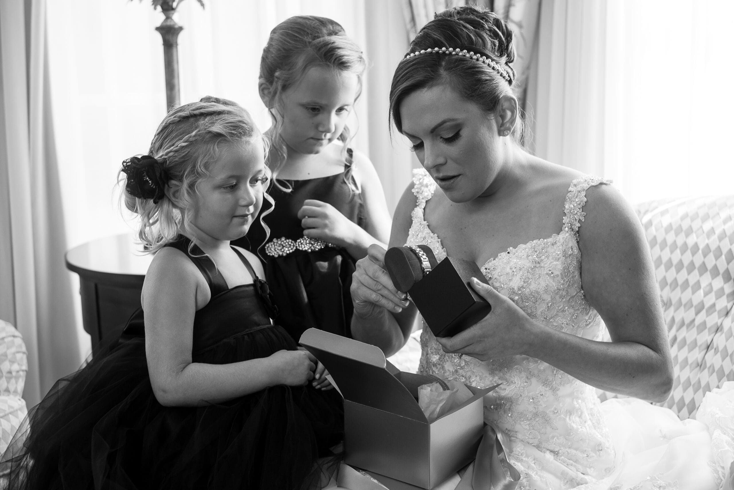 young ring bearer holding the wedding rings