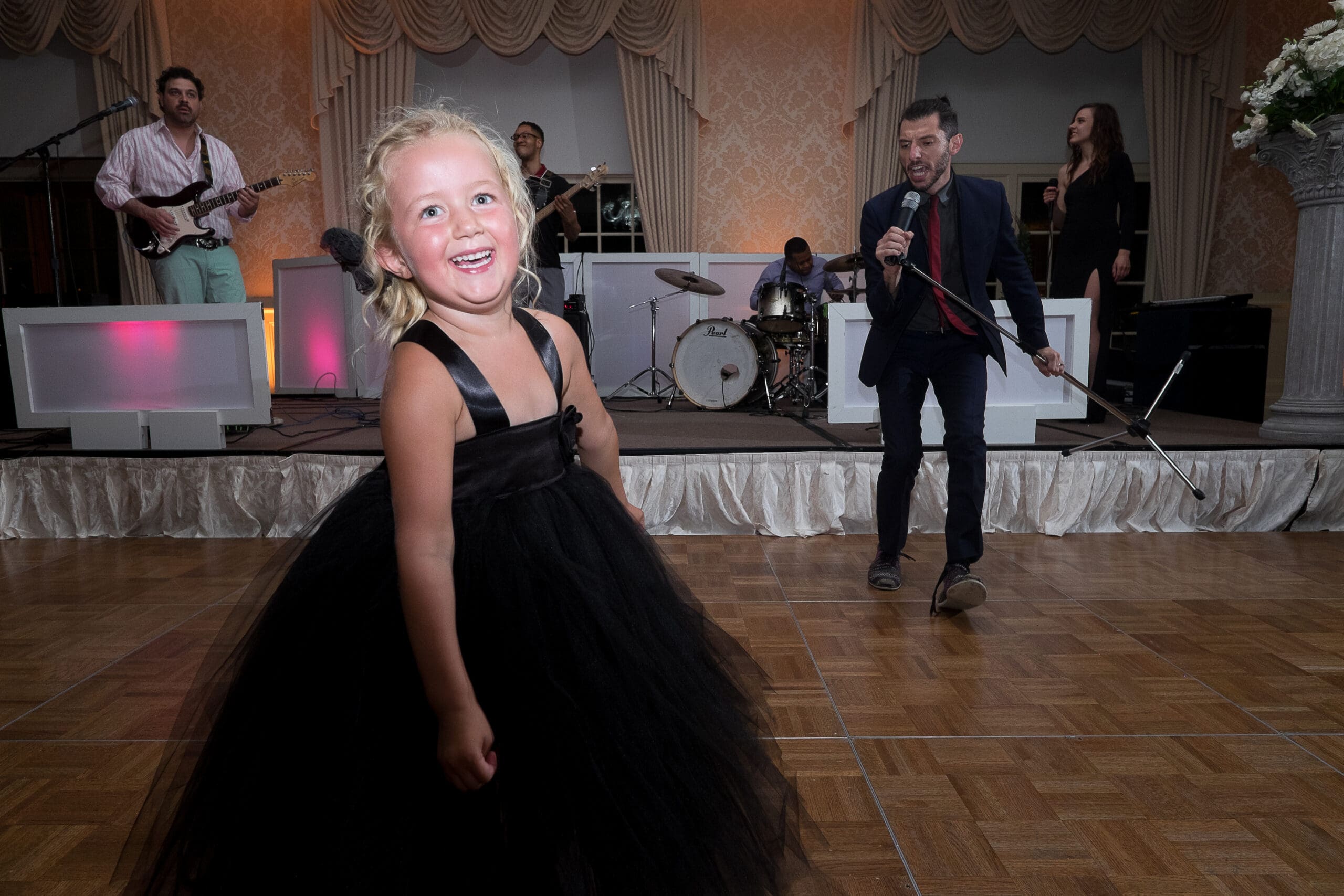 candid moment of children during wedding portraits