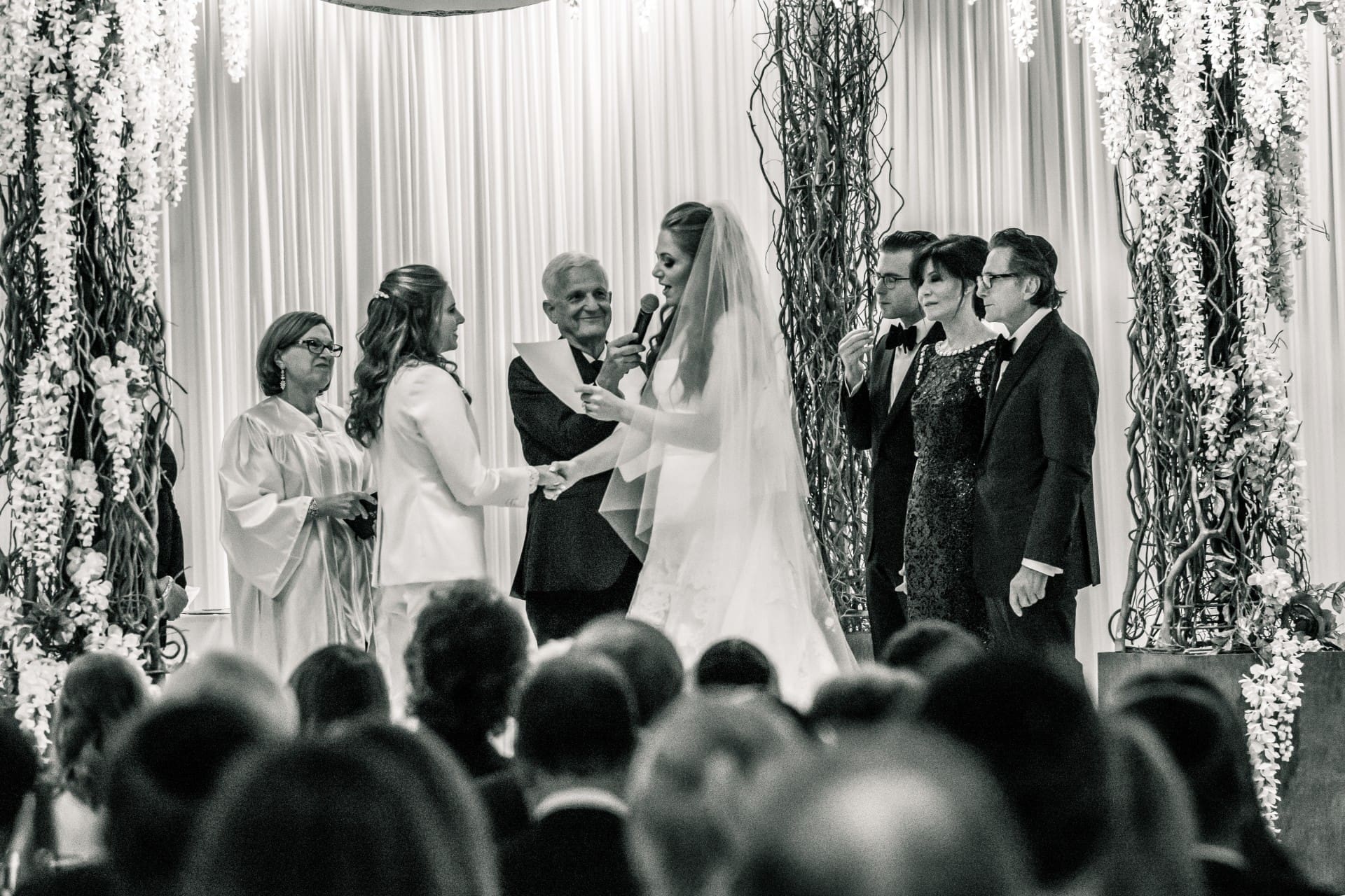 Bride and groom exchanging vows during a meaningful wedding ceremony.