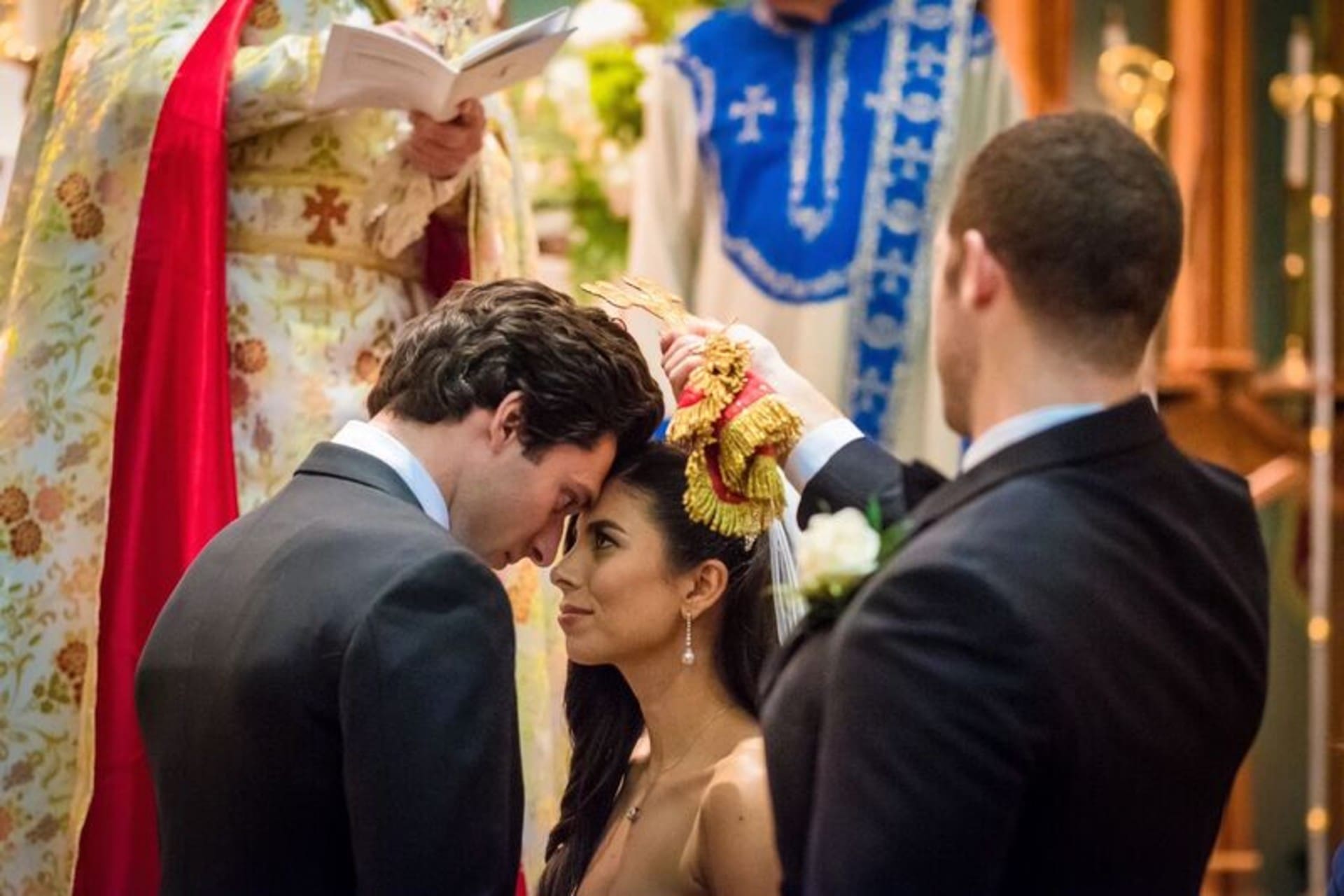 Bride and groom sharing a meaningful moment during their wedding ceremony.