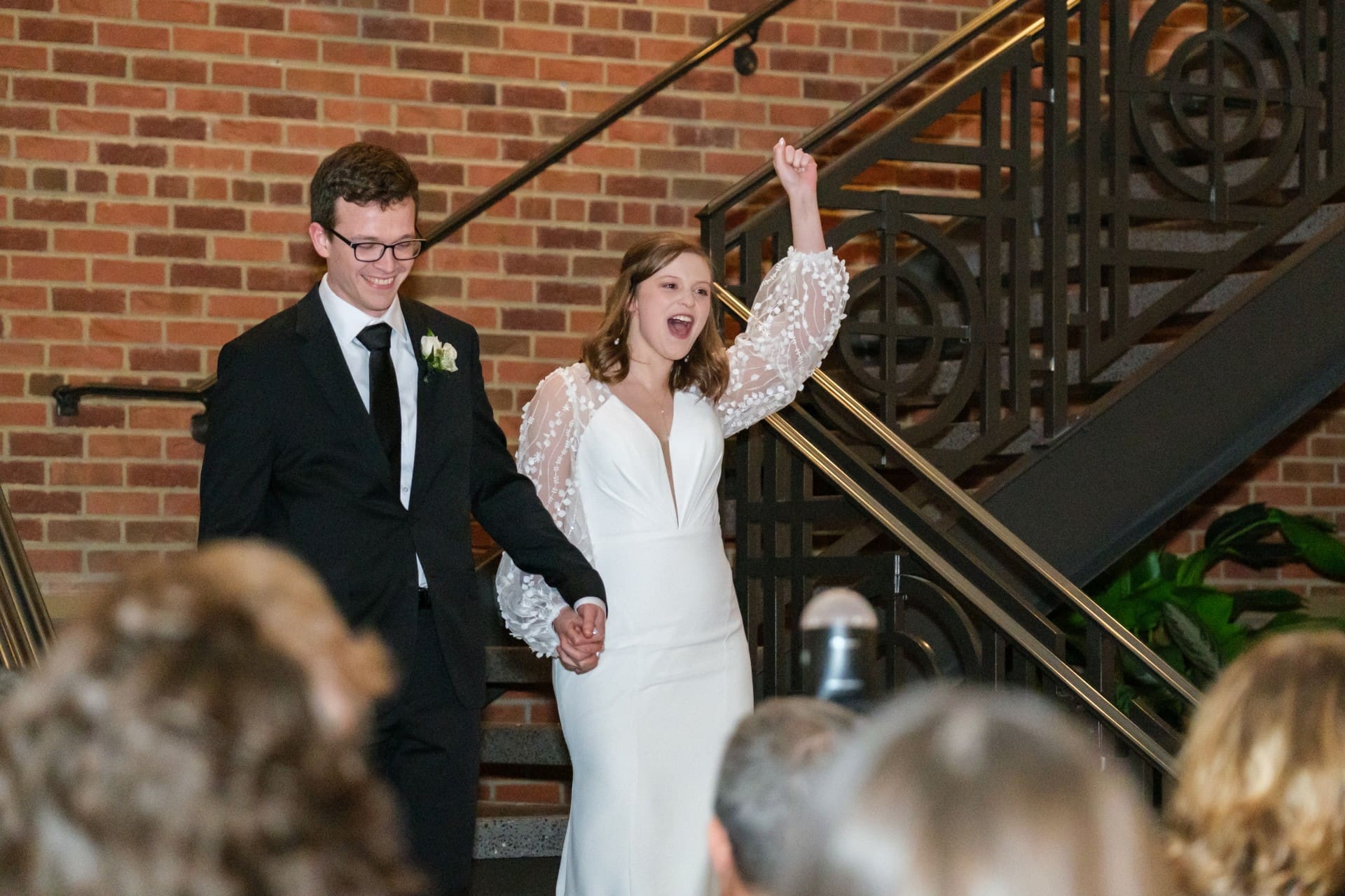 Andrew and Rachel celebrating with guests at St. John’s Resort in Plymouth, Michigan