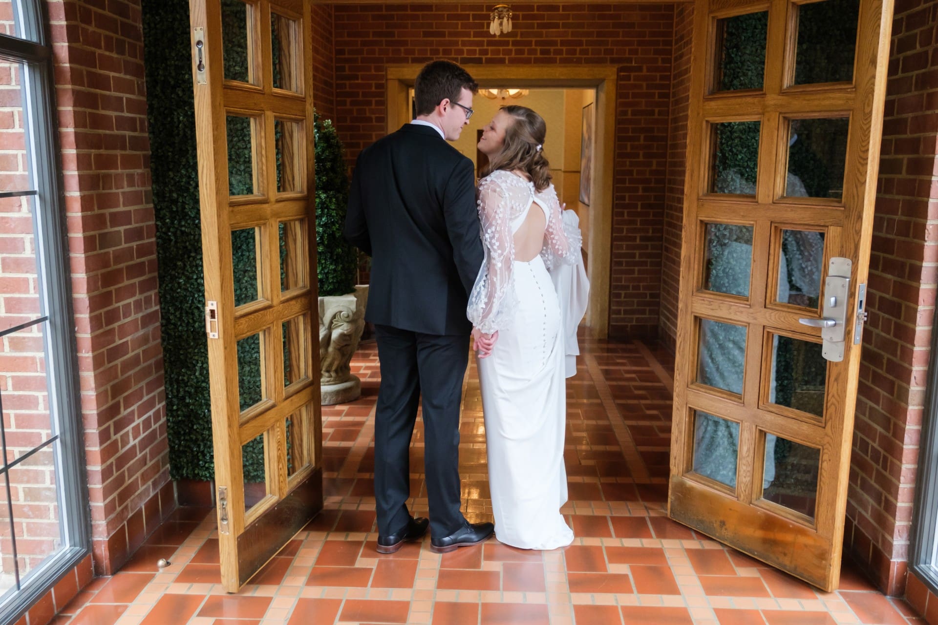 Andrew and Rachel sharing a quiet moment before their wedding ceremony