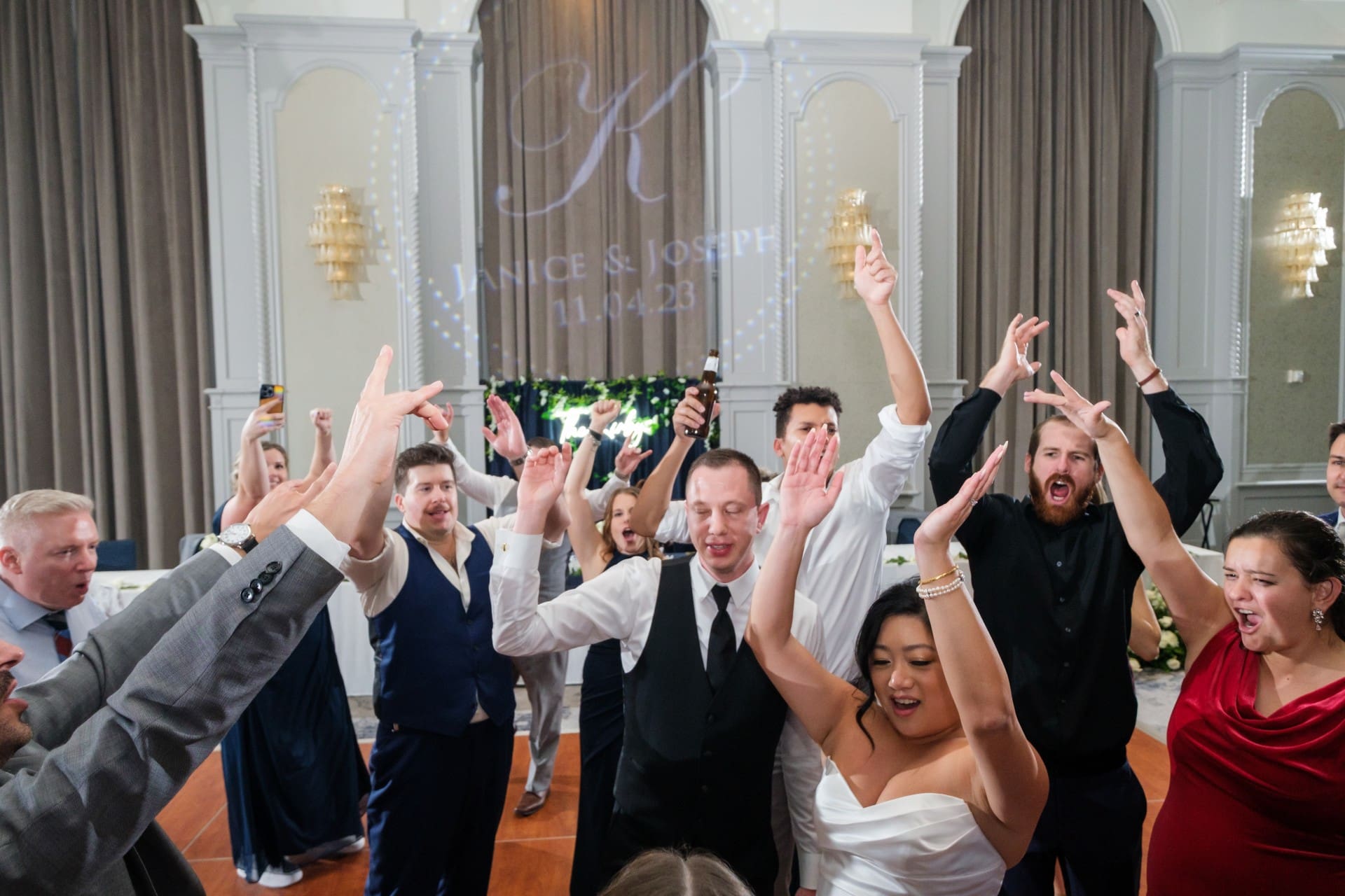 Detroit wedding guests celebrating together during the reception