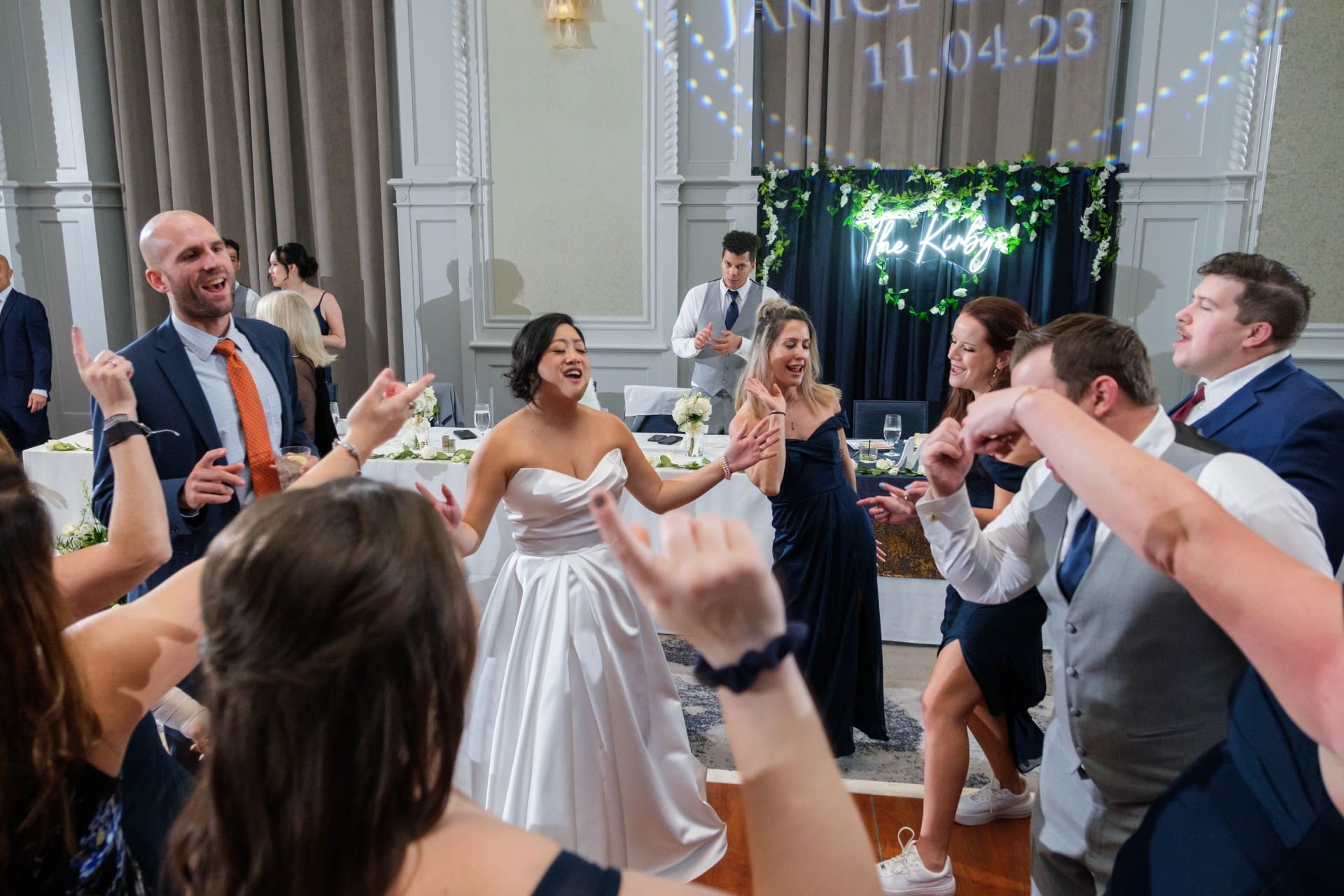 Detroit wedding photographer documenting a candid reception moment