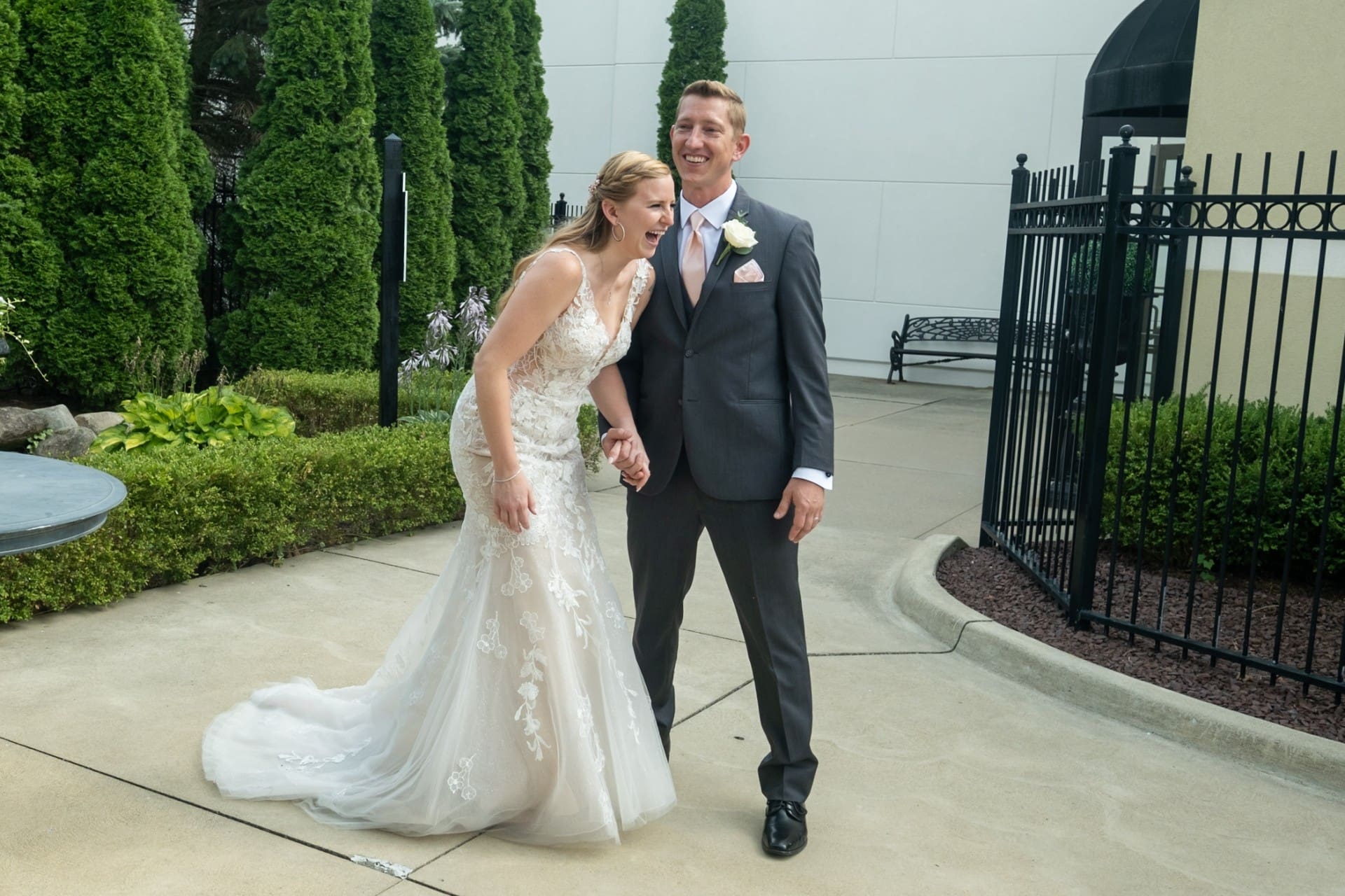 Bride and groom walking together after their Detroit wedding