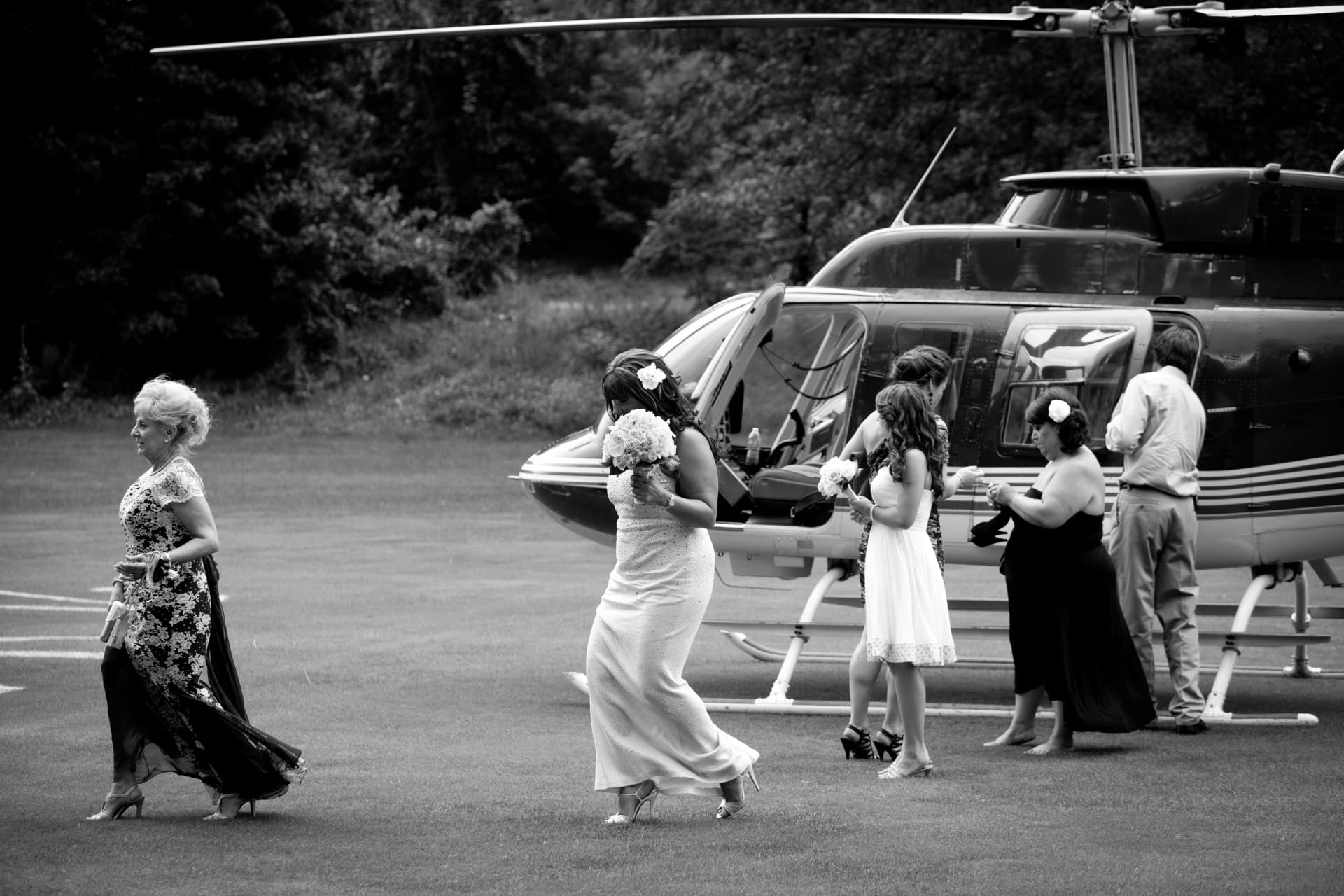 Wedding party walking together from one part of the celebration to another