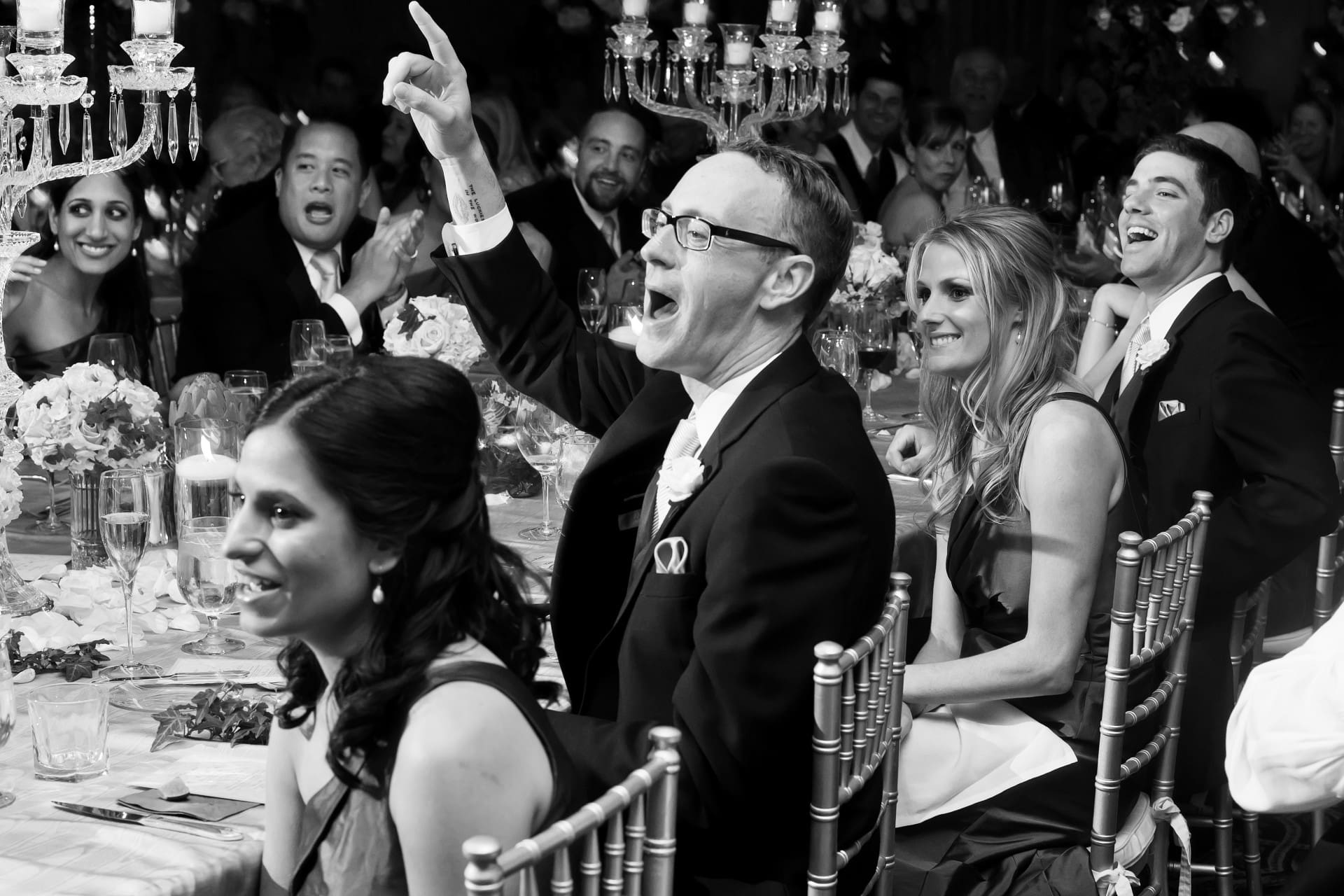 Wedding guests watching and celebrating during the reception