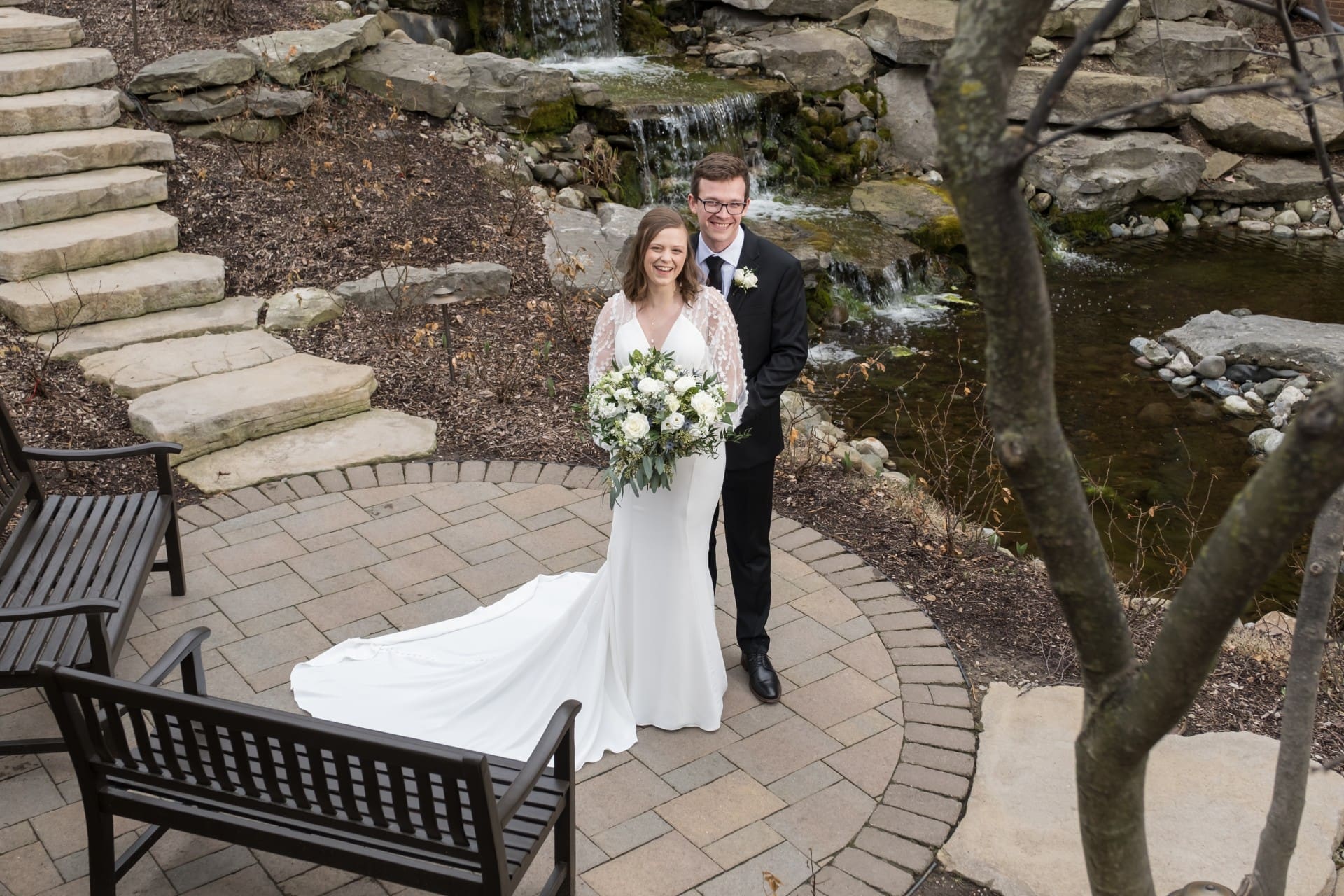 Bride and groom standing together outdoors at St. John’s Resort in Plymouth, Michigan
