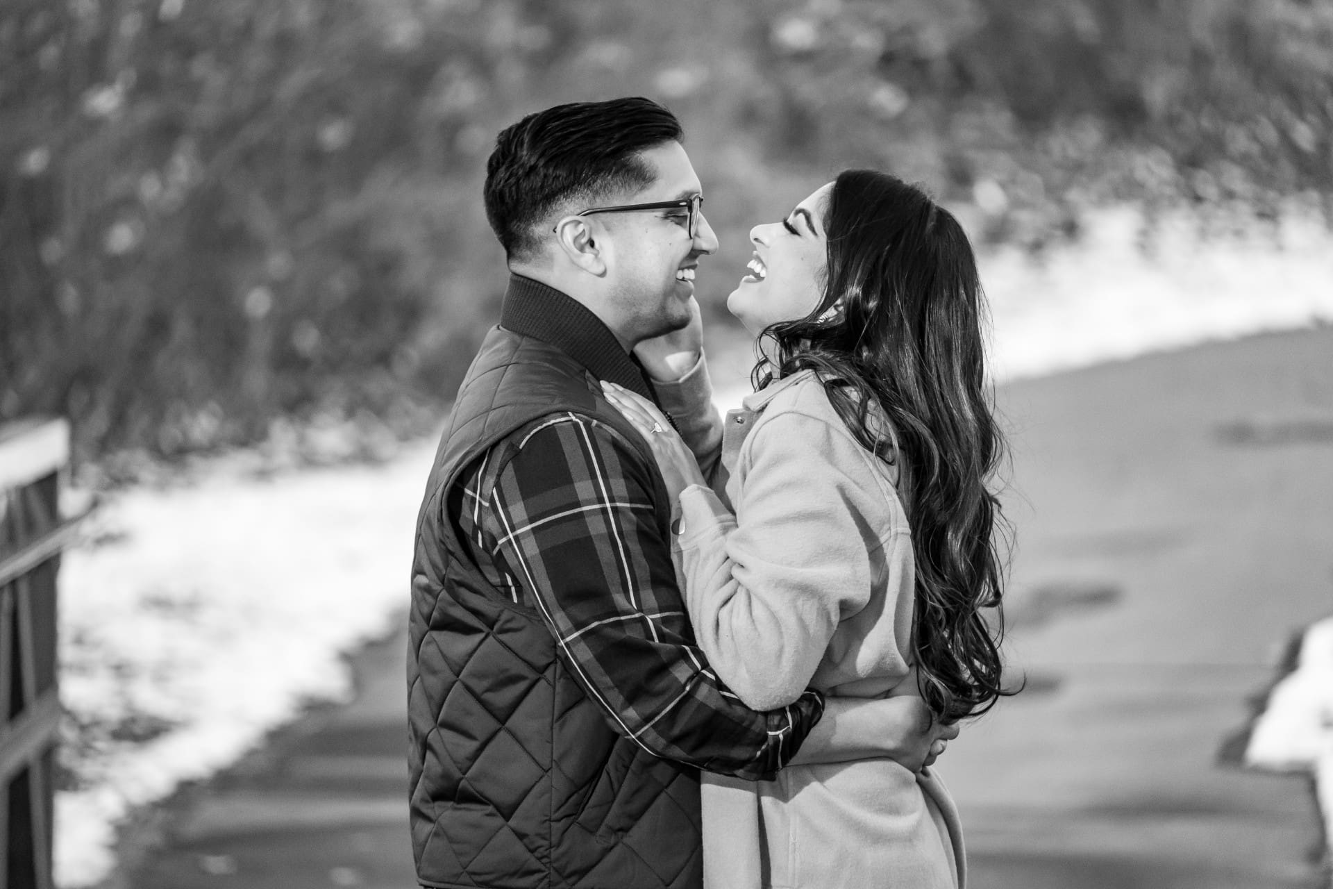 Couple laughing together during a Plymouth Michigan proposal