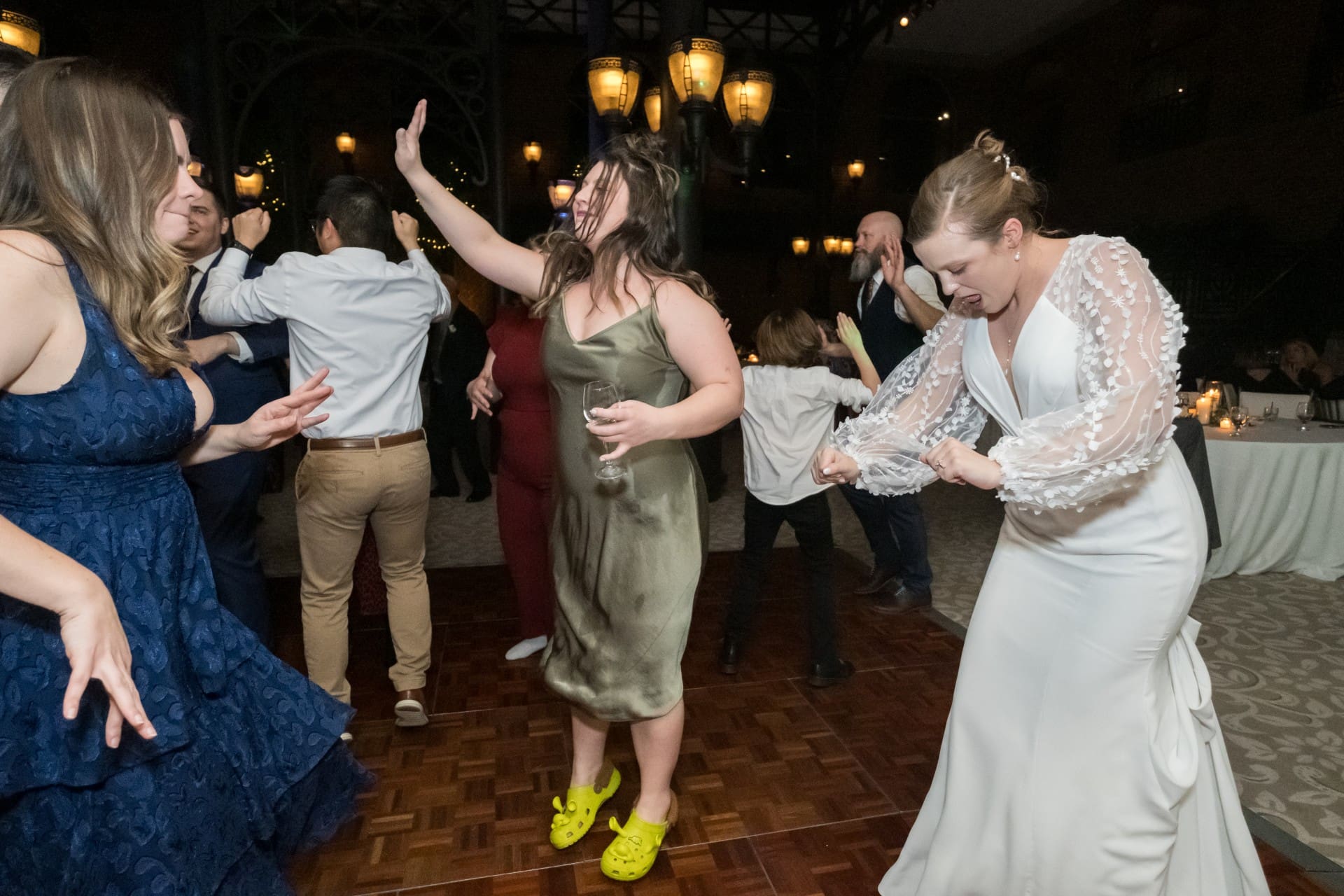 Bride and guests dancing together at a St. John’s Resort wedding in Plymouth, Michigan