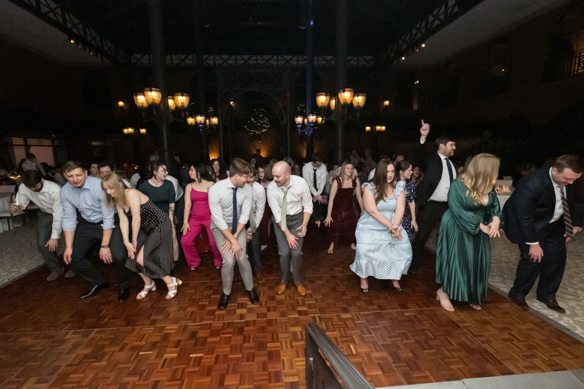 Wedding guests dancing together at St. John’s Resort in Plymouth, Michigan