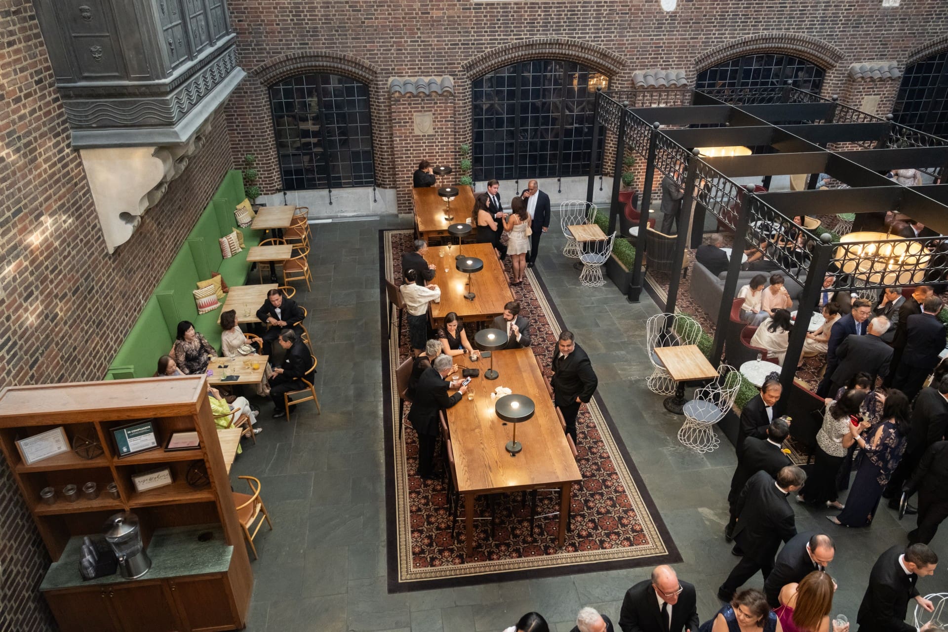 Guests gathering and dining during the Chang 50th Anniversary celebration at the Detroit Institute of Arts